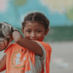 Exposición Fotográfica Itinerante: «En la Cancha, Mil Mujeres, Mil Historias» Llega a Argentina